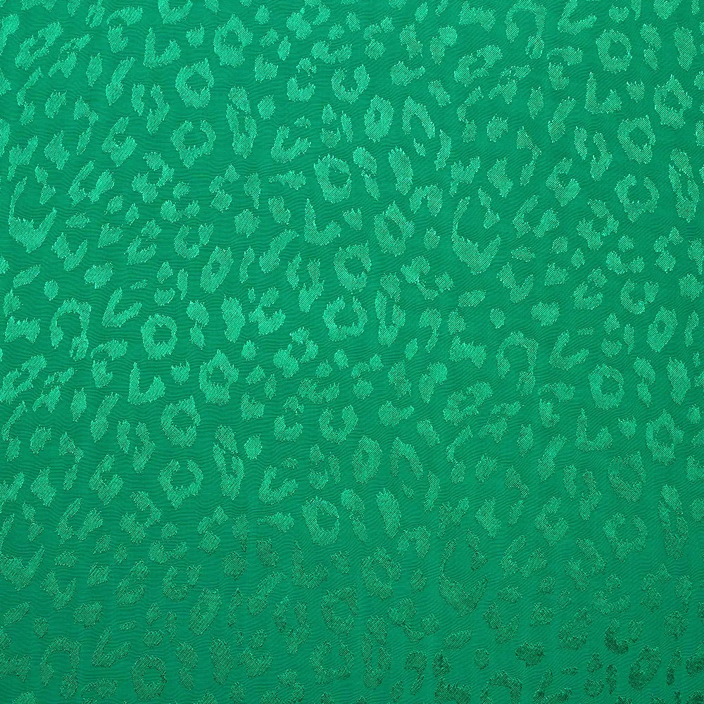 Jacquard de viscose satiné léopard fond vert