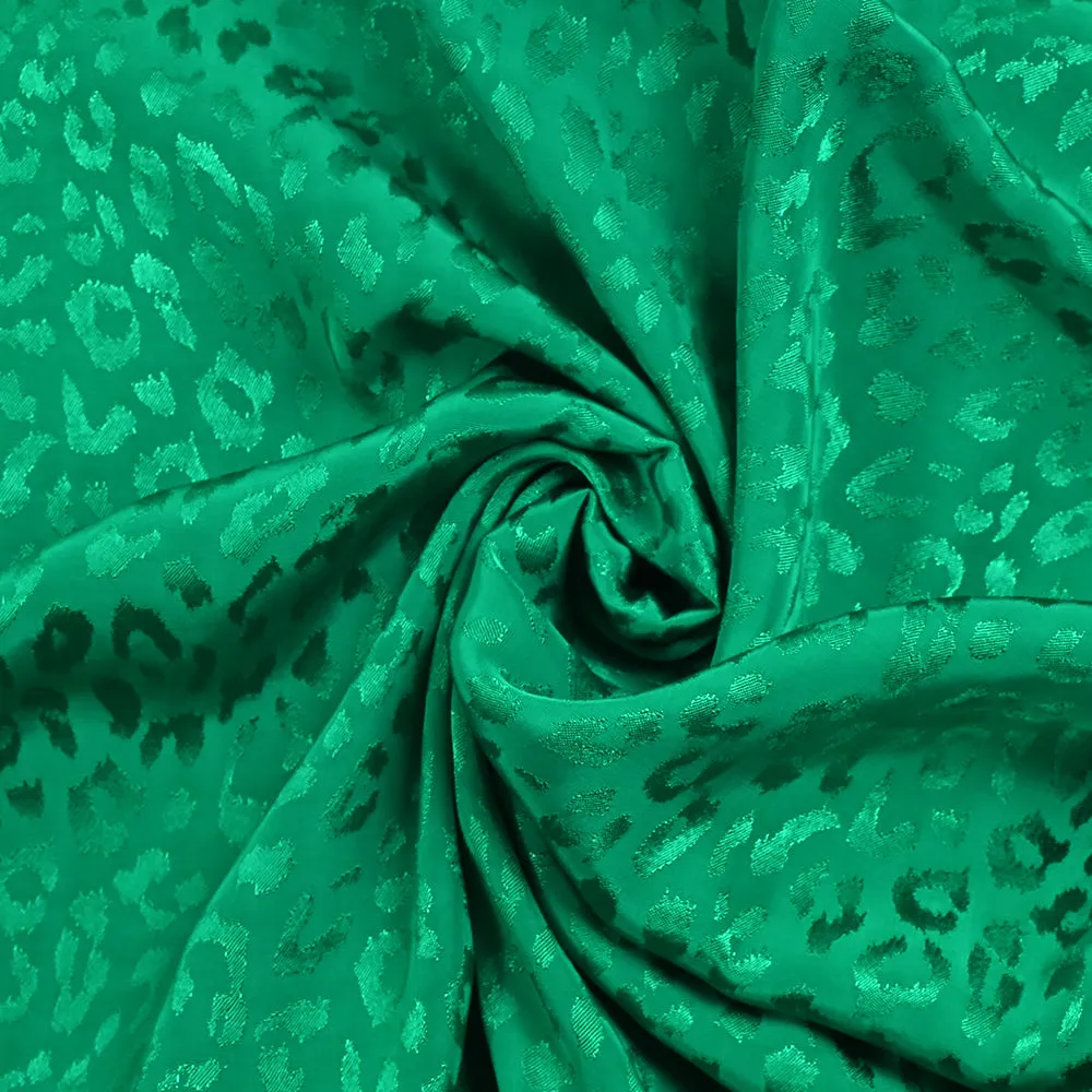 Jacquard de viscose satiné léopard fond vert